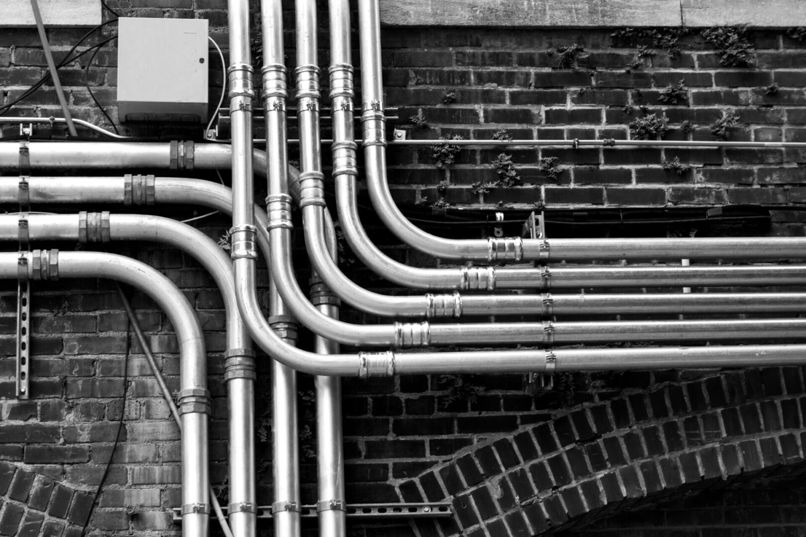 A bunch of pipes that are in the wall